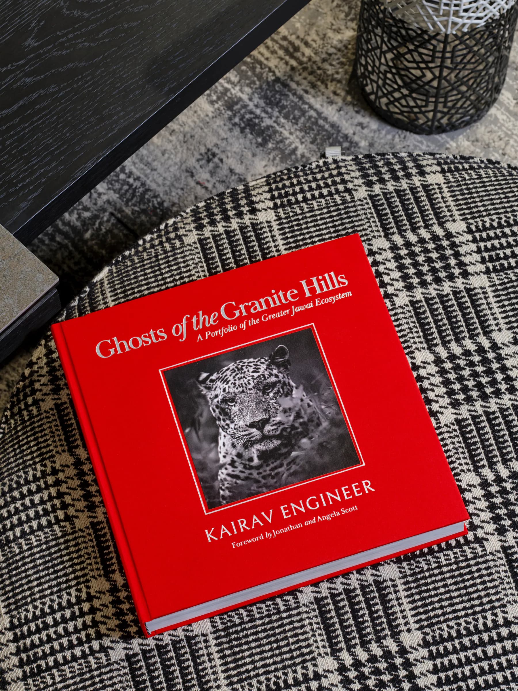 Red clothbound Ghosts of the Granite Hills collector's book displayed in an interior